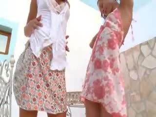Two ors chicks naked grass